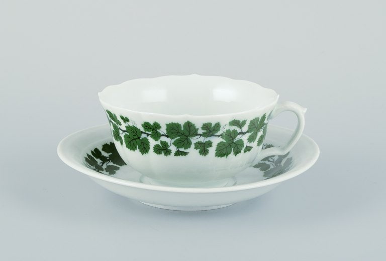 Meissen, Green Ivy Vine, a set of three tea cups and saucers.: Meissen, Green Ivy Vine, a set of three tea cups and saucers. Mid-20th century. Marked. Perfect condition. Mixed factory qualities. Cup: Diameter 9.8 cm. without handle x Height 4.8 cm. Reserve: $252