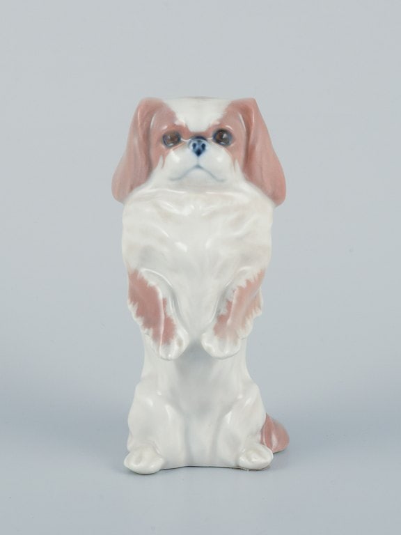 Royal Copenhagen, porcelain figurine of standing Pekingese dog.: Royal Copenhagen, porcelain figurine of standing Pekingese dog. Model 1776. Marked. In perfect condition. First factory quality. Dimensions: Height 12.0 cm x Diameter 6.0 cm. Reserve: $140.00 Shipping