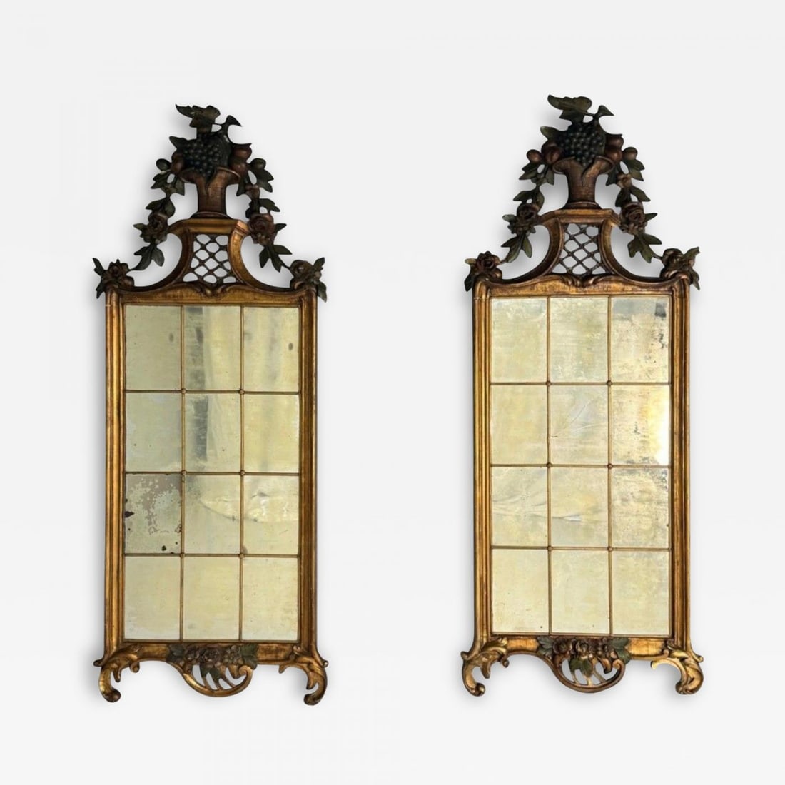 Louis XVI, Wall Mirrors, Giltwood, Antiqued Mirror, Fruitewood Motif 20th C.: Title: Louis XVI, Wall Mirrors, Giltwood, Antiqued Mirror, Fruitewood Motif 20th C. Description: Louis XVI, Wall Mirrors, Giltwood, Antiqued Mirror, Fruitewood Motif 20th C. This pair of Louis XVI-sty