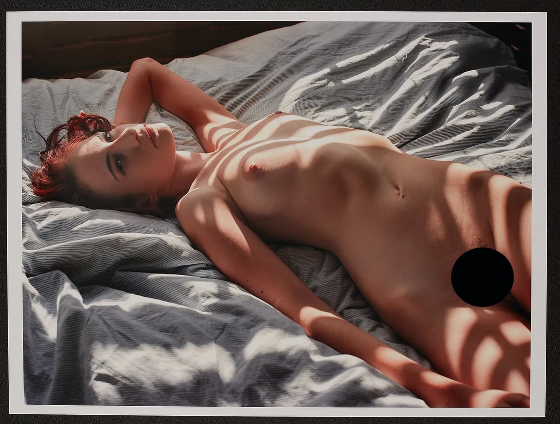 Spiros Polits: On Bed 1/25: Title: On Bed 1/25 Artist: Spiros Politis (1969-) Period: 2009 Materials: photography Size: 16" x12" Description: Kayt in the evening light. Printed on the premium Canson Baryta Photographique II (310