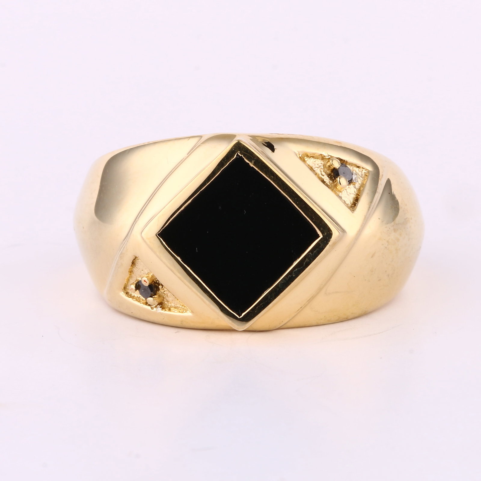 Ring: Title: Ring Description: Black Onyx Square 8.00mm - 1Pc + Black Diamond S/C Round 1.50mm - 2Pcs Date/Period: After 2000 Materials: 925 Silver W/Yellow Gold Plating Dimensions: Mix Reserve: $38.00 Ship