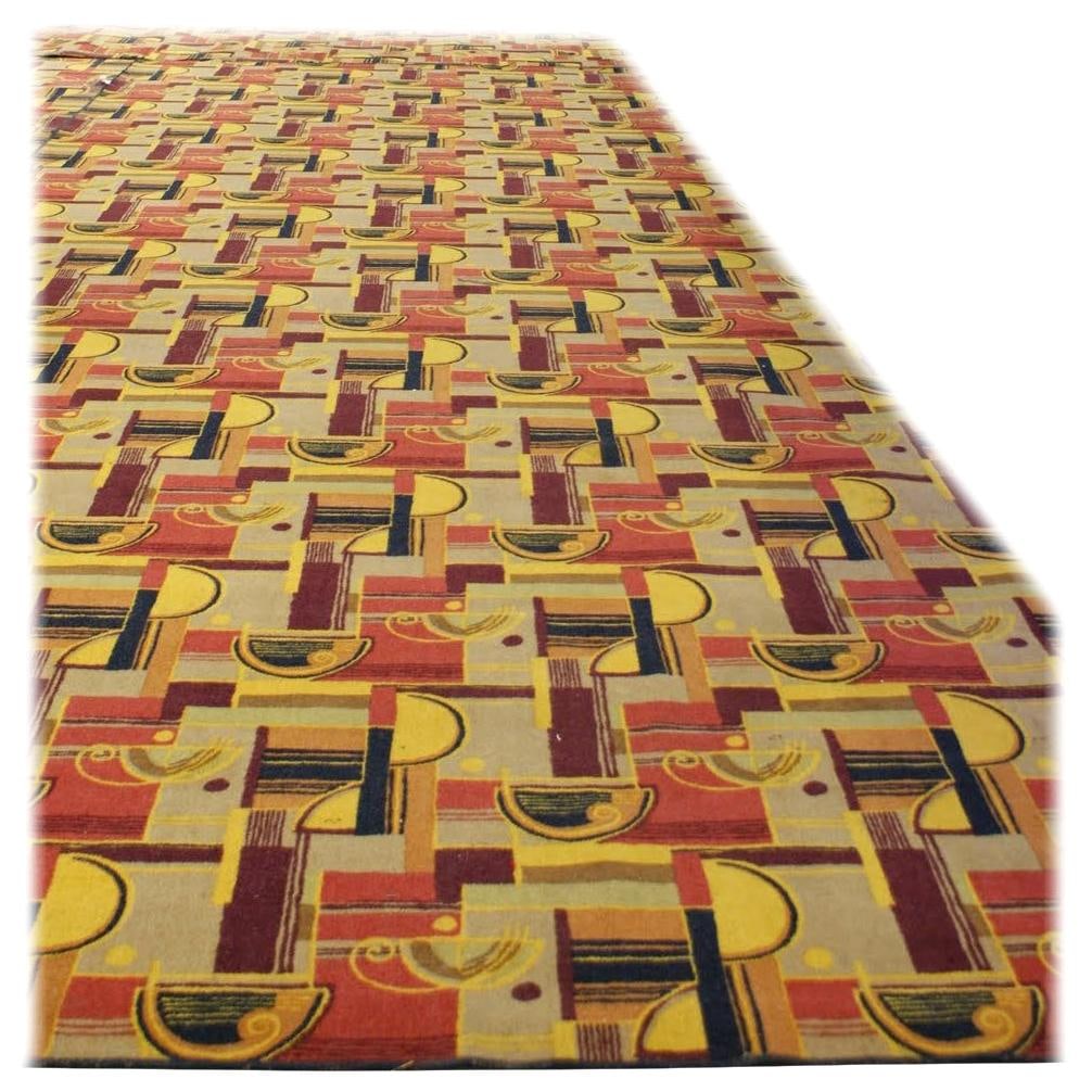 Large Art Deco Style Area Rug: About the Item Large Art Deco style Area rug featuring a multicolored geometric streamline pattern with warm reds, browns yellows, and beige tones, much like those from Edward Fields. This rug is floo