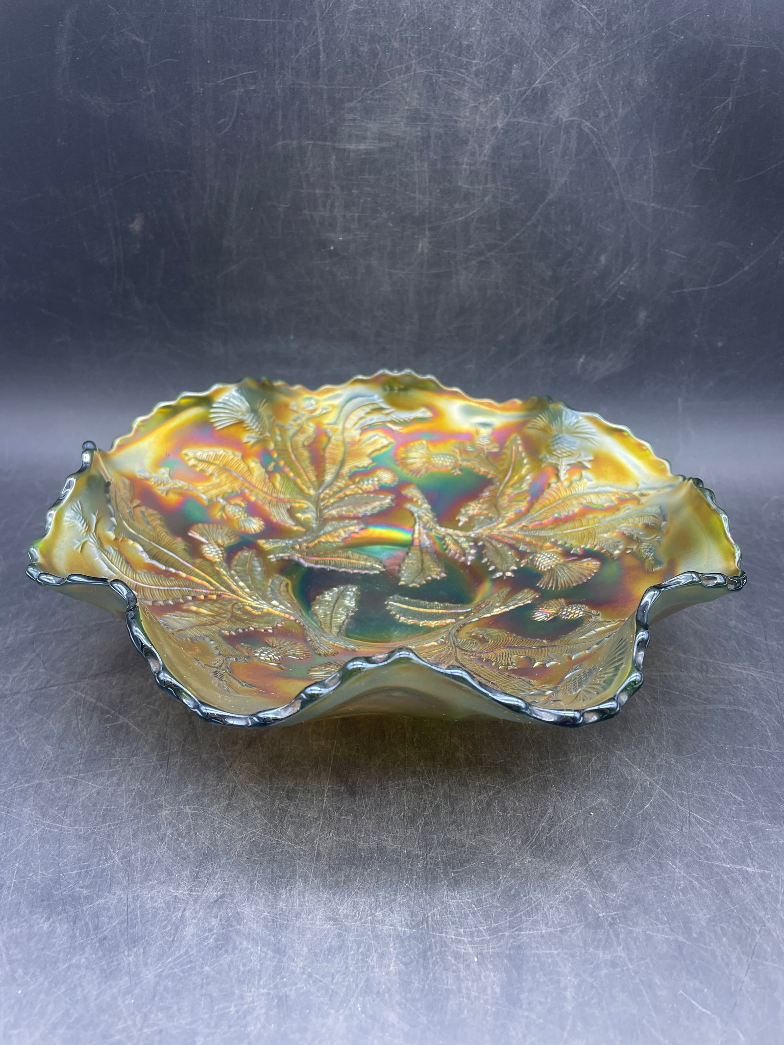 Fenton Carnival Glass Vintage Embossed Thistle Ruffled Bowl: Title: Fenton Carnival Glass Vintage Embossed Thistle Ruffled Bowl Date/Period: Dimension: Approx. 8.75" diameter Material: glass Additional Information: Antique Fenton Thistle Carnival Glass Ruffled 