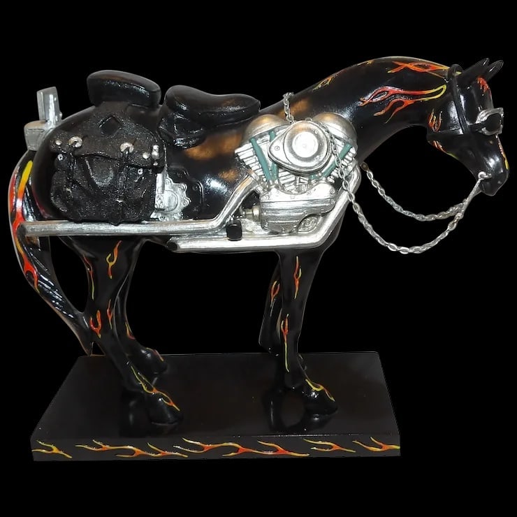 Trail of Painted Ponies #1450 Motorcycle Mustang: This Trail of Painted Ponies #1450 Motorcycle Mustang was retired in 2013 – It is numbered 1E/4,141. It is in near MINT condition but has no box. Paint etc. is in perfect condition. Dated on lic
