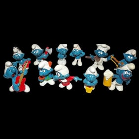 Eleven Vintage Smurf Figurines