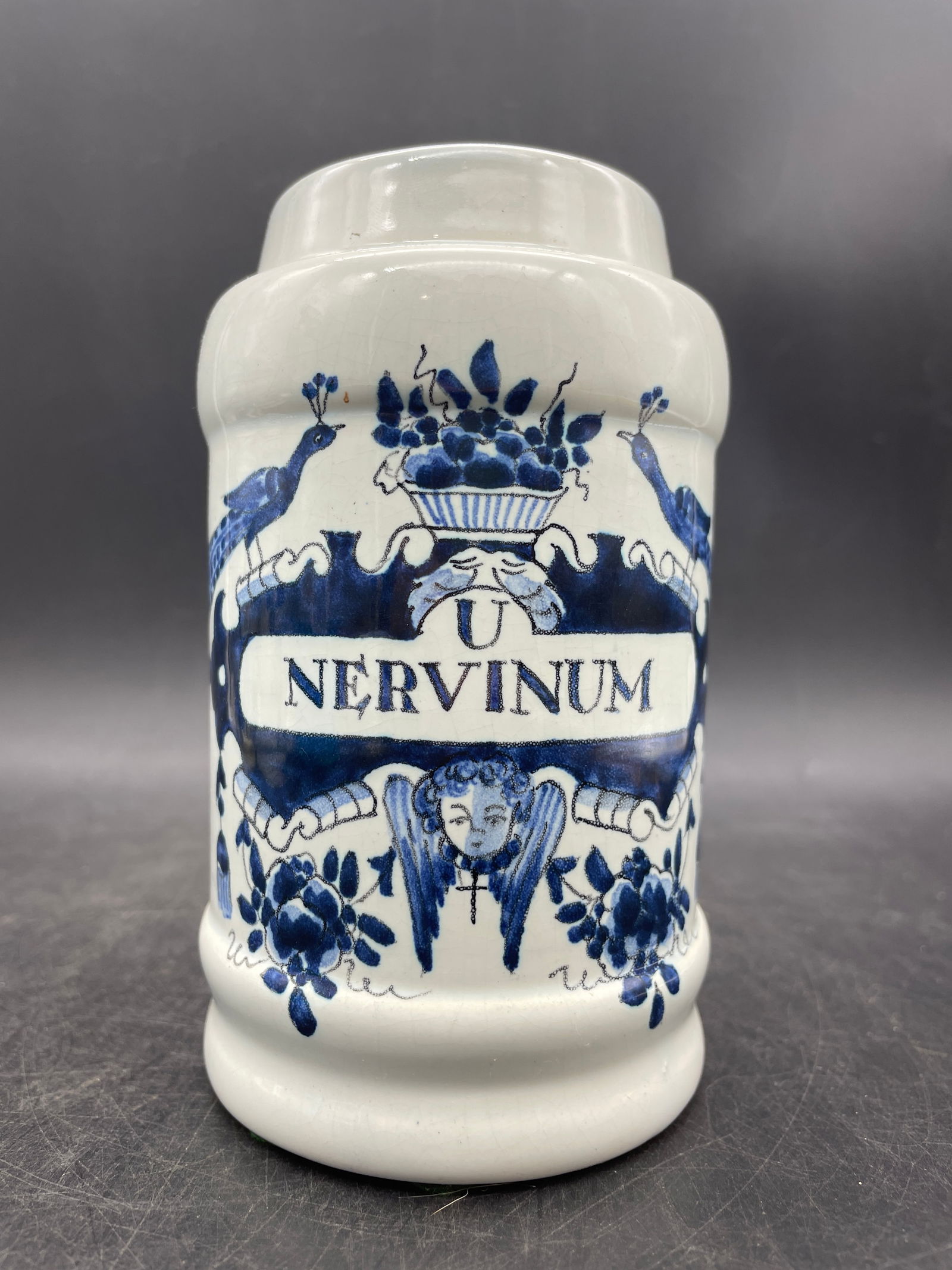Oud Delft Apothecary Tobacco Jar Made in Holland U Nervinum: Title: Oud Delft Apothecary Tobacco Jar Made in Holland U Nervinum Date/Period: UNKNOWN Dimension: approx. 5.5 x 3 Material: CERAMIC Additional Information: OUD DELFT APOTHECARY TOBACCO JAR MADE IN HO