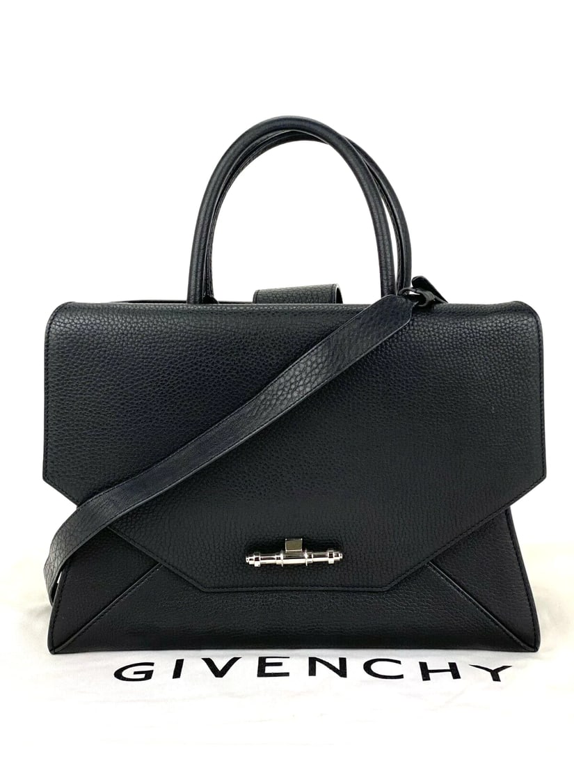 Givenchy Hand Bag Obsedia Medium Flap Black Pebbled Calfskin Satchel: Pre-Owned 100% Authentic Givenchy Medium Obsedia Black Satchel Wear it 2 ways! RATING: B...Very Good, well maintained, shows minor signs of wear MATERIAL: pebbled calfskin leather STRAP: removable lea