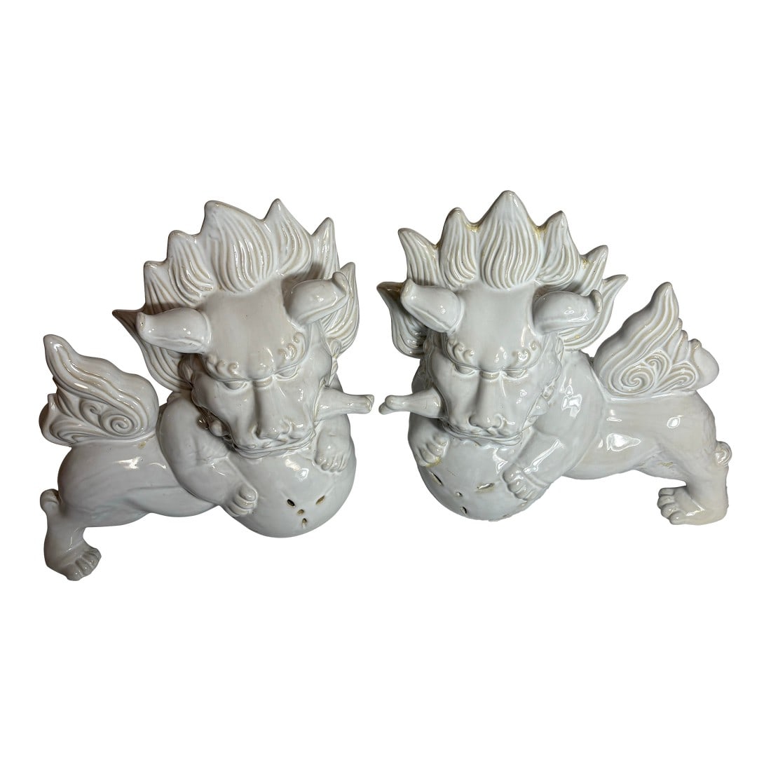 A Pair of Stylized Ceramic With White Glaze Chinese Foo Dogs