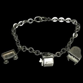 Darling Vintage Charm Bracelet with Piano, Dog House, and Wagon