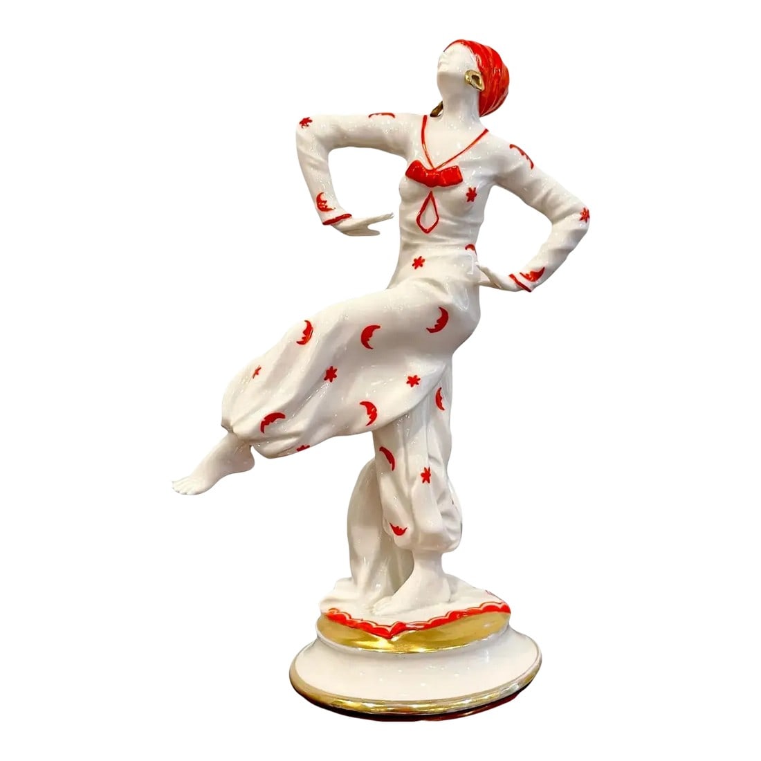 Early 20th Century Art Deco Figurine of 'Mata Hari' by Capodimonte / Naples Porcelain Company: Art Deco Figurine of 'Mata Hari' by Capodimonte / Naples Porcelain Company Italy, circa 1925 An exceptional work, displaying grace and movement, subtly hand- painted. The seductive turban and gold ear