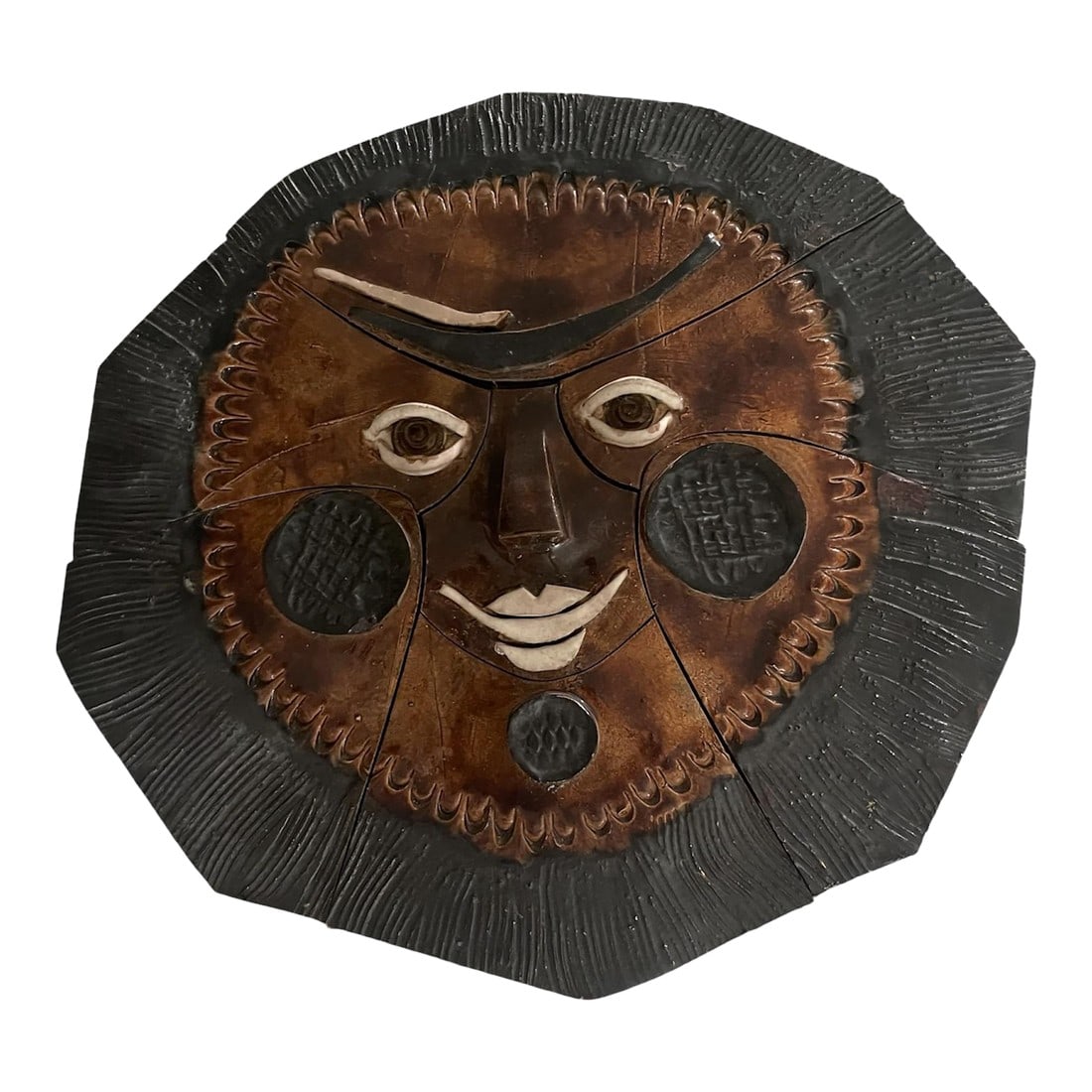 French Wall Art "Soleil" Roger Capron Style: Highly decorative wall sculpture made in a patchwork of glazed ceramic elements with brown and black panels. It is mounted on wood and easy to hang. It is in the style of Roger Capron and Jean Derval