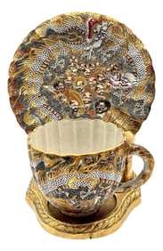 Extraordinary Meiji Satsuma Cup & Saucer, Raised Gilt Enamel Signature, Kozan Zo - a Pair