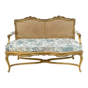 Mid-Century French Louis XV Style Caned and Carved Settee in Floral Linen
