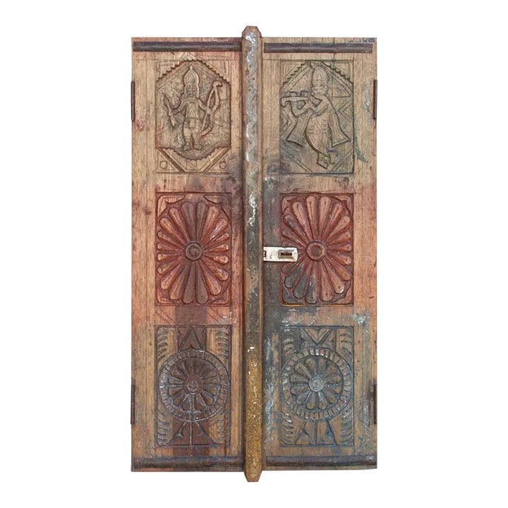 Antique Indo-Portuguese Carved Window: Beautiful 19th century antique Indian window found in Goa, Southern India. This rustic window panel is hand-carved from teak and features a lovely carved design with a Krishna figure on top, a sunburs