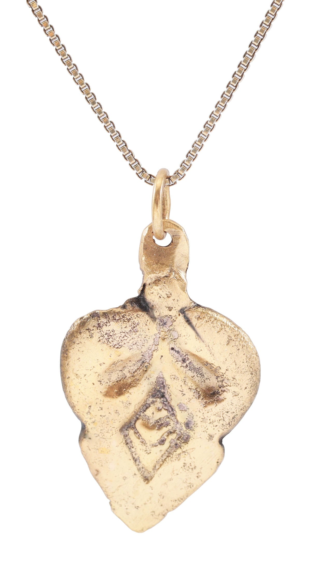 VIKING HEART PENDANT, 10TH-11TH CENTURY, DANELAW ENGLAND: Just over 3/4” (0.78”) height. Gilt bronze of stylized form with cusped top, indented and central trefoil. For Vikings, the heart stood for bravery, fortitude, loyalty, and integrity, attr