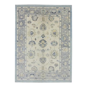 Early 21st Century Handwoven Wool Turkish Oushak Rug in Blue and Cream Floral Design 5'11" X 7'9"
