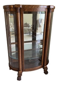Antique Tiger Oak Curved Glass Mirrored Back Curio Cabinet on Claw Feet