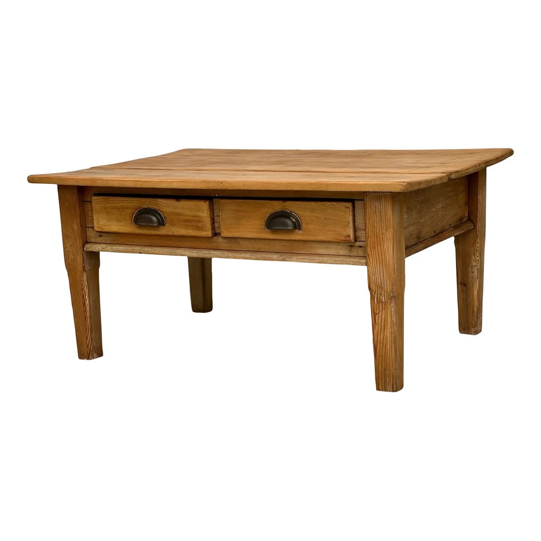 19th Century English Pine Coffee Table: Once a humble dairy table in rural England, this 19th century pine piece has been thoughtfully adapted in our workshop to serve as a coffee table, bringing a sense of heritage and quiet beauty to cont