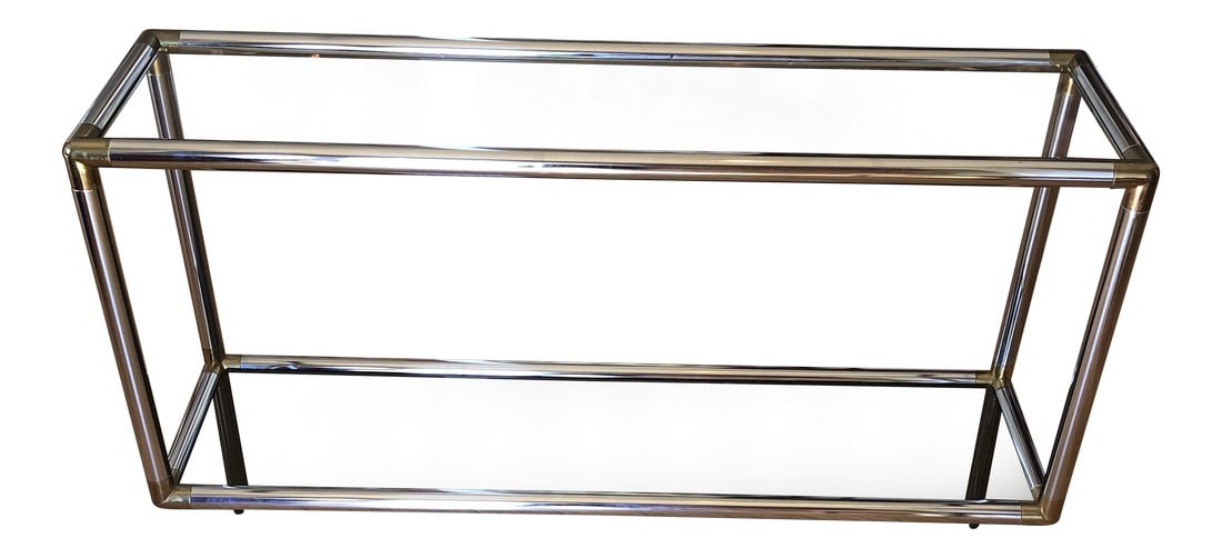 1970s Contemporary Brass and Chrome Tubular Console: Substantial and tubular chrome and brass console table With two tier glass construction. Perfect for an entryway or hallway. Great for the interior designer. Condition: Alterations: Original Condition