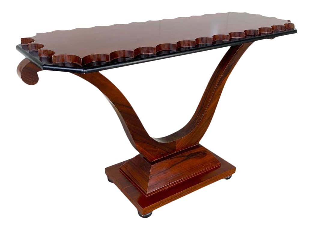 Mid 20th Century French Modern Rosewood Scalloped Console Table: French Modern rosewood scalloped console table With beautifully figured scalloped top, raised on lyre pedestal base The console measures: 54" wide to the end of the lyre base, the ebonized tabletop me