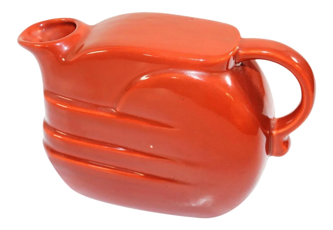 1960s Retro Barware Vintage Bright Orange Pitcher by Joseph Magnin Italy: Midcentury bright orange pitcher designed in the 1960s by Joseph Magnin. Vivid Italian pottery glazed orange retro barware pitcher with handle in a modern stylized form. The ceramic pitcher was handma