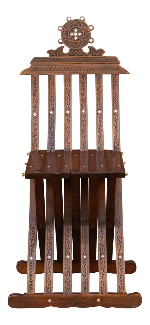 Mother of Pearl Syrian Antique Chair: This slim wooden Syrian chair features intricate foliate carvings and mother of pearl inlays adorn the wood throughout. It has an inlaid and pierced carved carved crown accenting the upper chair rails