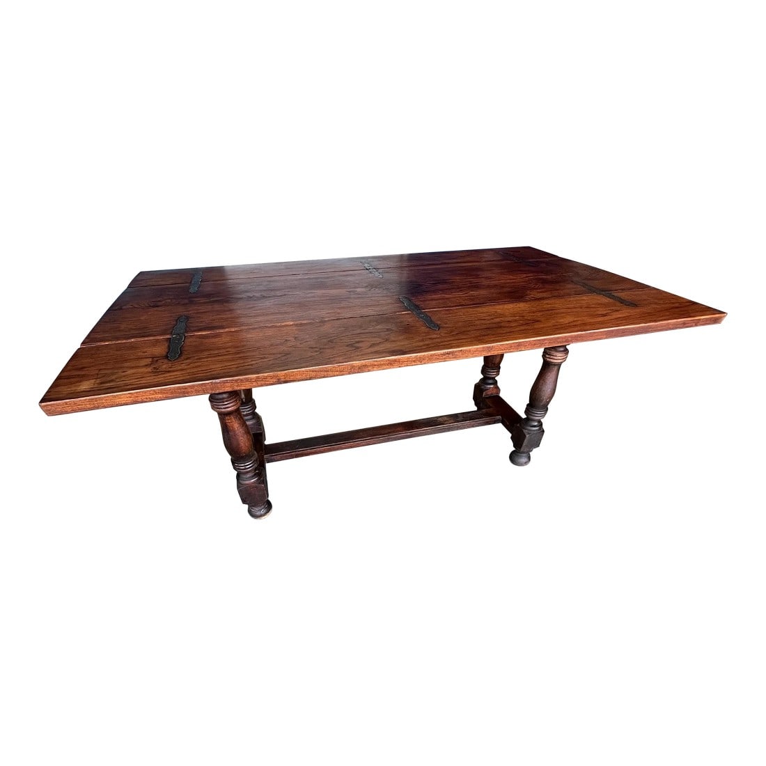 19th Century French Country Drop Leaf Console Table: Early 19th century antique French console table that seamlessly transforms into a dining table Crafted from French oak, it ingeniously unfolds to the width of a dining table. Adding a touch of medieva