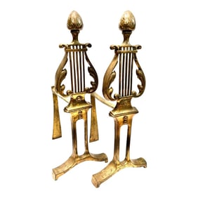 Mid 20th Century Brass Andirons Featuring a Lyre Neoclassical - A Pair