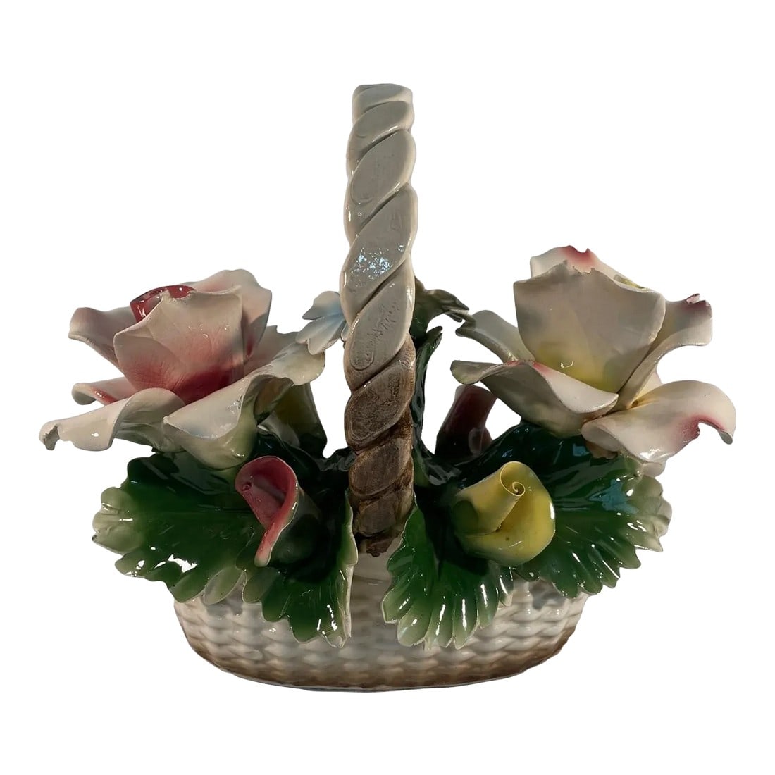 Large Vintage Italian Capodimonte Ceramic Rose Basket: A graceful and delicate ceramic Rose Basket arrangement by the prestigious Capodimonte manufacturer in Italy. Circa Mid 20th Century. Maker's marks on the bottom. This lovely arrangement features a ha