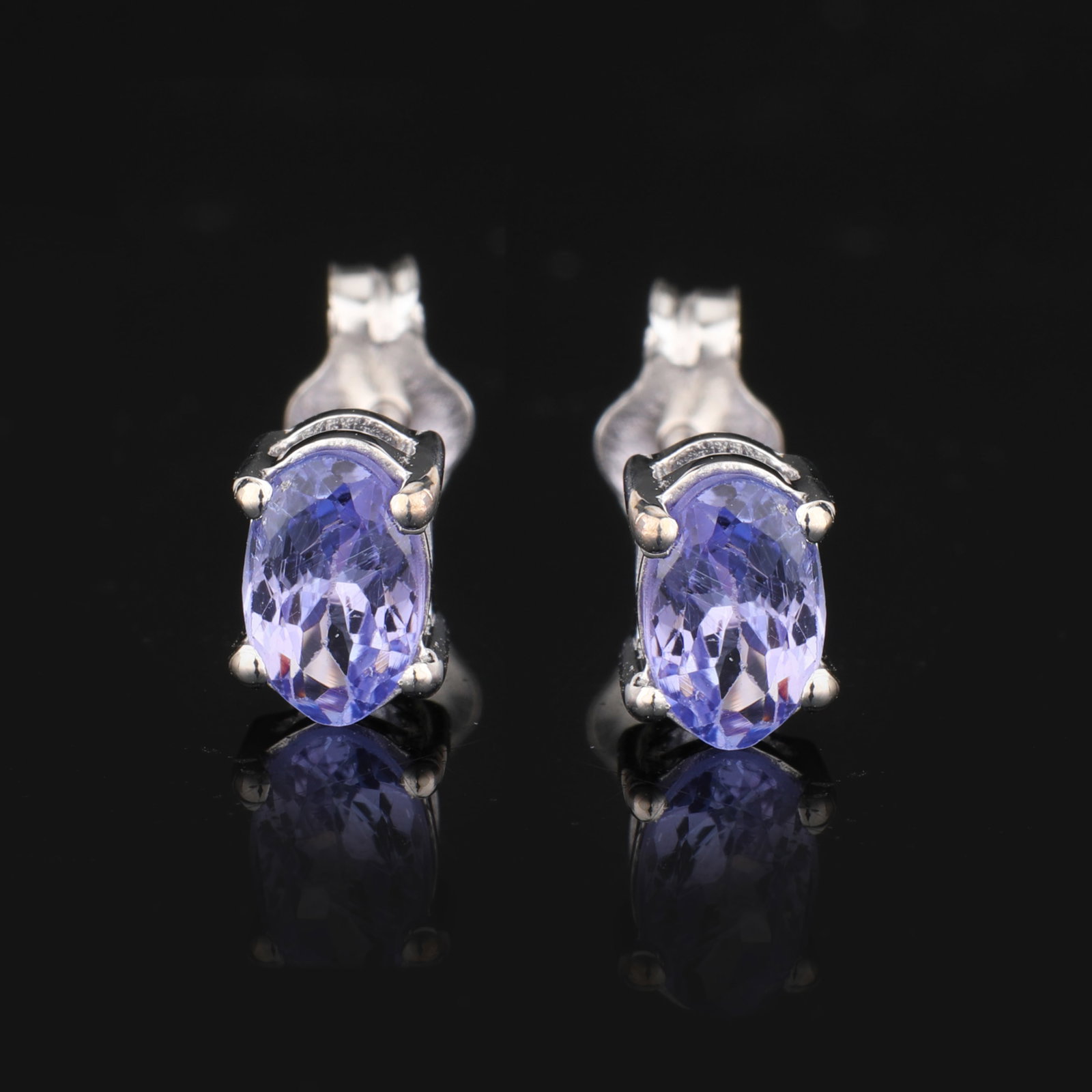 Earrings: No Reserve! Title: EarringsDescription: Tanzanite ( A-A+ ) Oval 6x4mm - 2Pcs ( Push Post )Date/Period: After 2000Materials: 925 Silver W/RhodiumDimensions: N/A Shipping: Domestic: Flat-rate of $40.00&