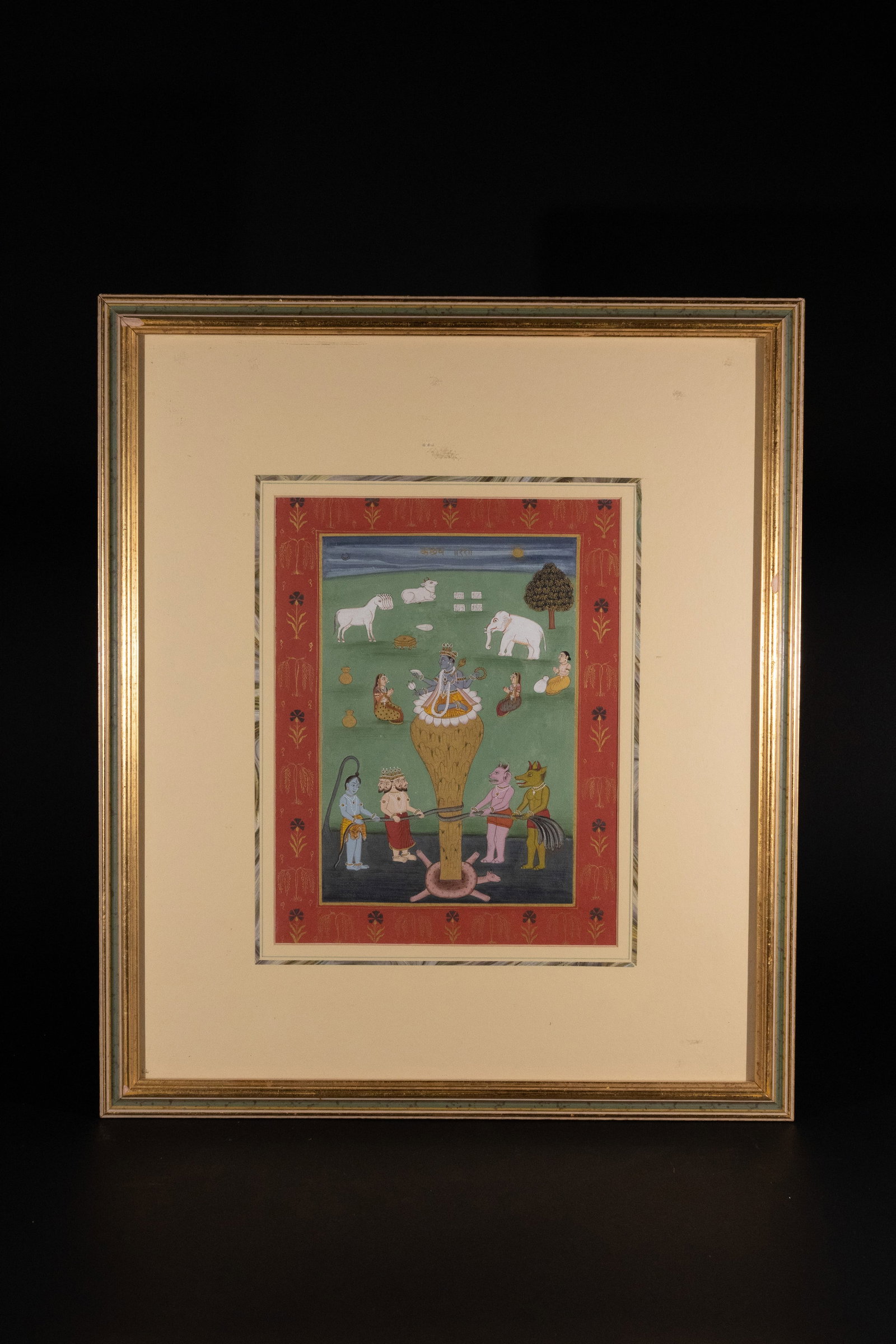 An Indian Miniature Painting Depicting the Churning of the Ocean (Samudra Manthan): An Indian miniature painting, executed in opaque pigments on paper, depicting a scene from Hindu mythology, the Churning of the Ocean (Samudra Manthan). The composition features a central blue-skinned