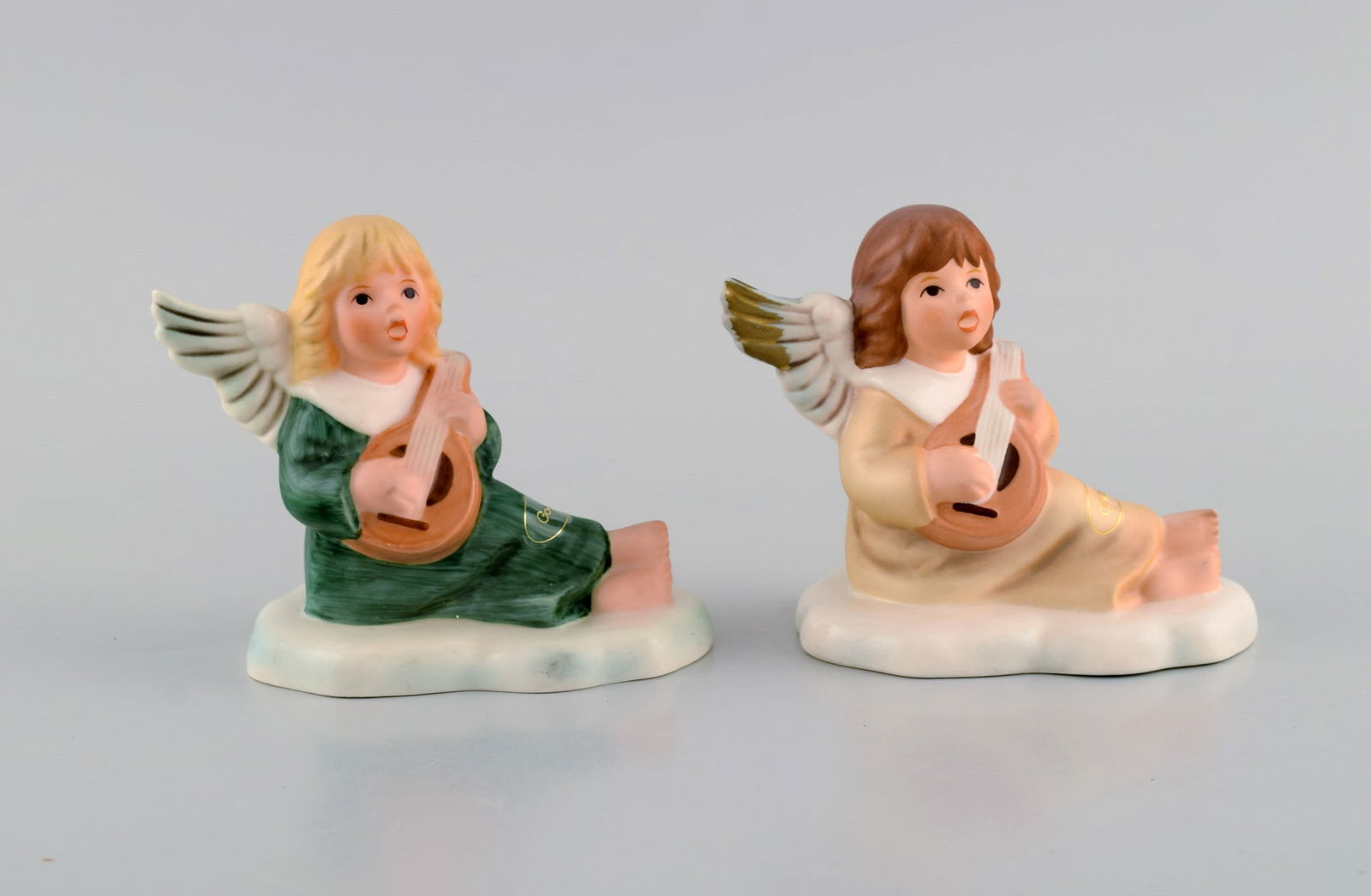 Goebel, West Germany. Two Christmas angels in porcelain. 1970s / 80s.: Goebel, West Germany. Two Christmas angels in porcelain. 1970s / 80s. Measures: 10.5 x 8.8 cm. In excellent condition. Stamped. Reserve: $119.00 Shipping: Domestic: Shipping rates are determined by d