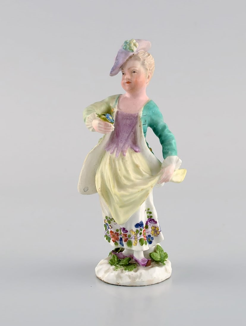 Meissen, Germany. Antique hand-painted porcelain figure. Lady with flowers. Late 19th century.: Meissen, Germany. Antique hand-painted porcelain figure. Lady with flowers. Late 19th century. Measures: 12 x 5.5 cm. In excellent condition. Minimal cut on flower. Stamped. Reserve: $259.00 Shipping