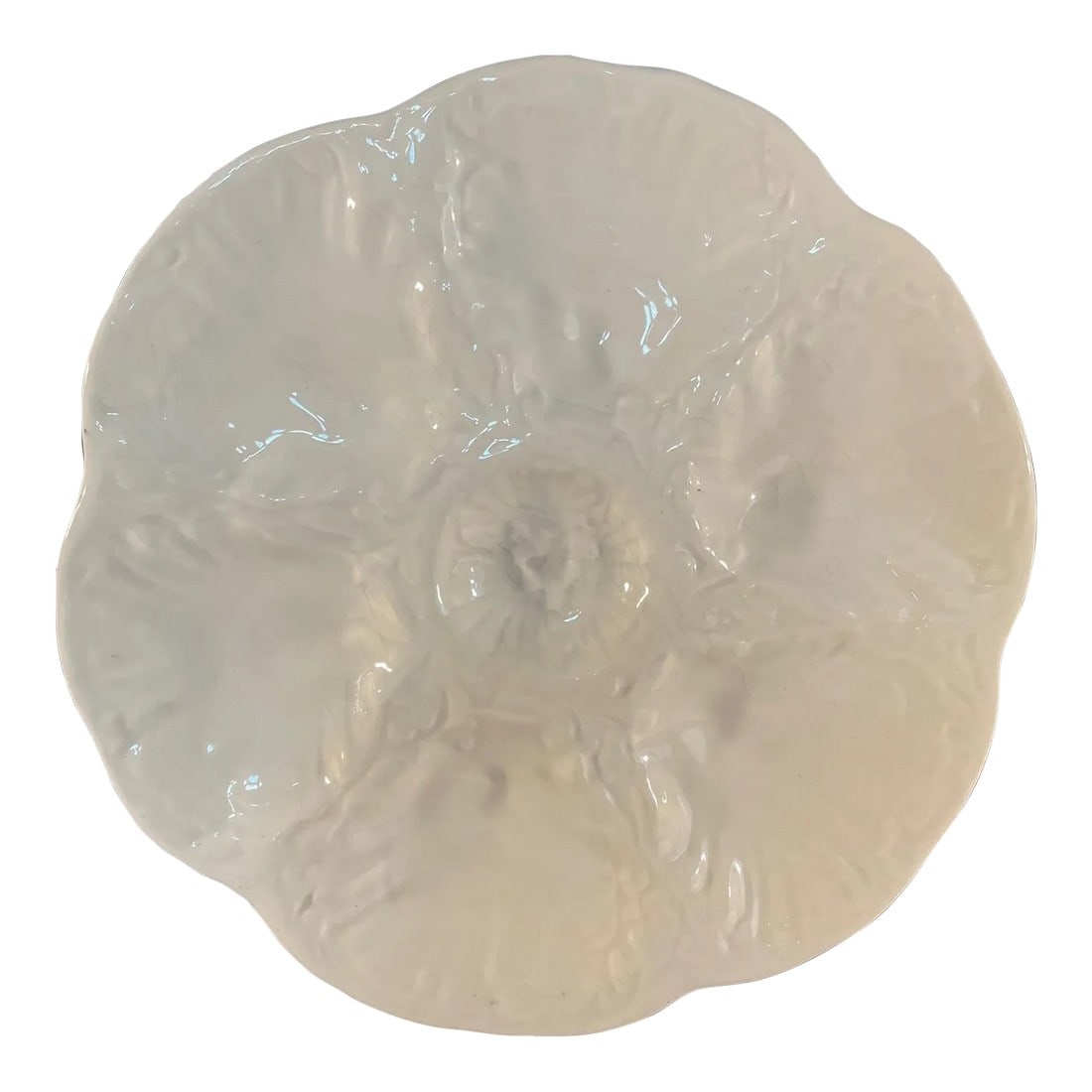 Mid 20th Century French Gien White Oyster Plate: A lovely Glazed French Ceramic White Oyster Plate by the well known earthenware makers of Gien in North Central France. Maker's mark on the underside. Circa 1940s. Bring some French charm and traditio