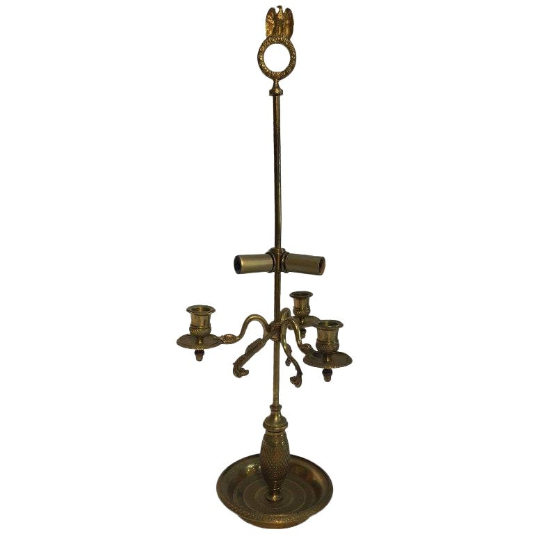 French Antique Brass Candelabra Converted Into a Table Lamp: Late 19th century French antique brass candelabra converted into a table lamp. Three candleholders in brass, nice hammered designs, the candle height are adjustable. The candleholders are in form of a