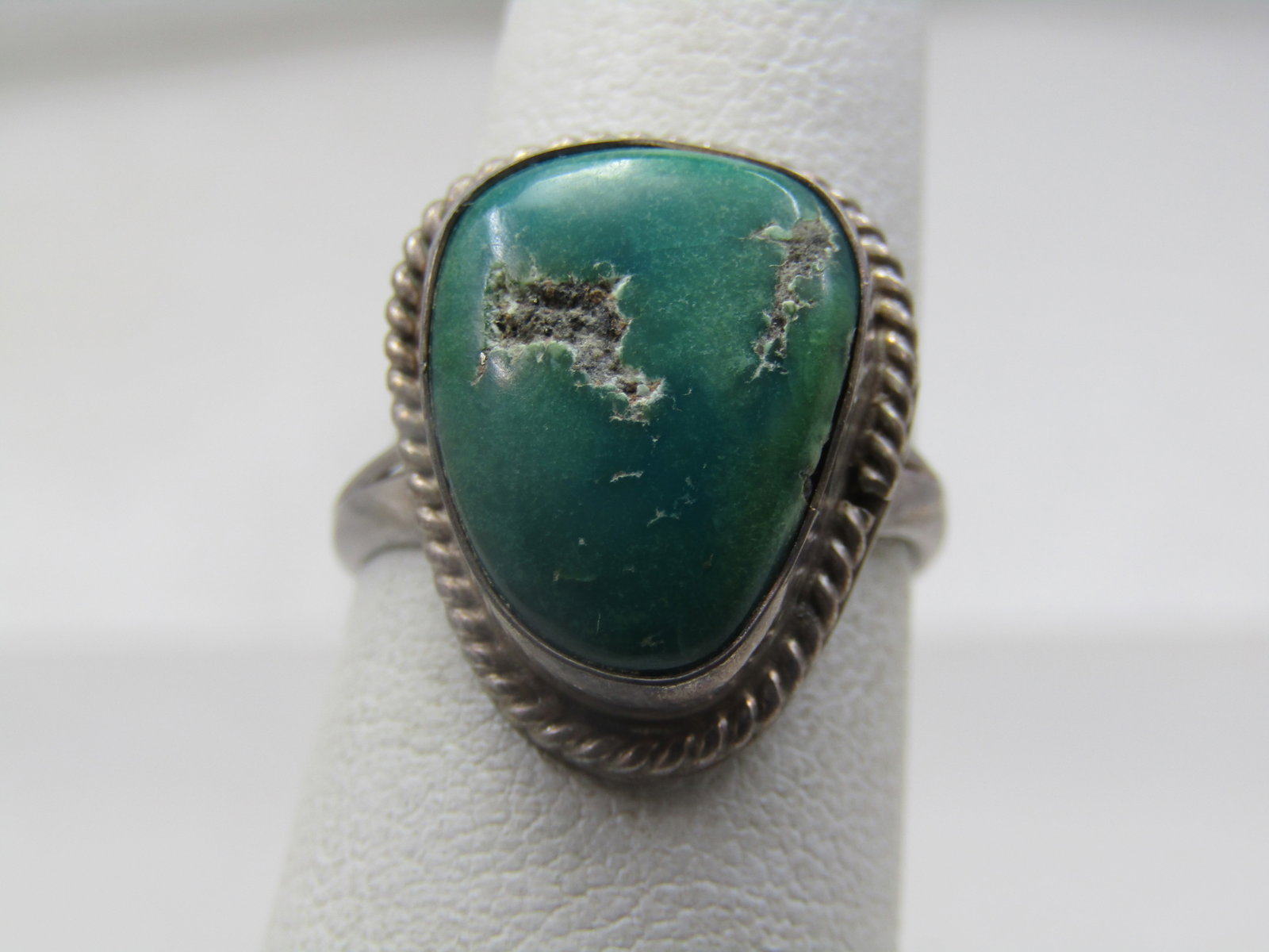 Vintage Sterling Southwestern Turquoise Ring, Sz. 6, 1960's-1970's: Vintage Sterling Southwestern Turquoise Ring, Sz. 6, 1960's-1970's. Appx. weight is 4.49 grams. Tested. It is not signed or marked. It is a green turquoise nugget that is polished and appx. 15mm by 12