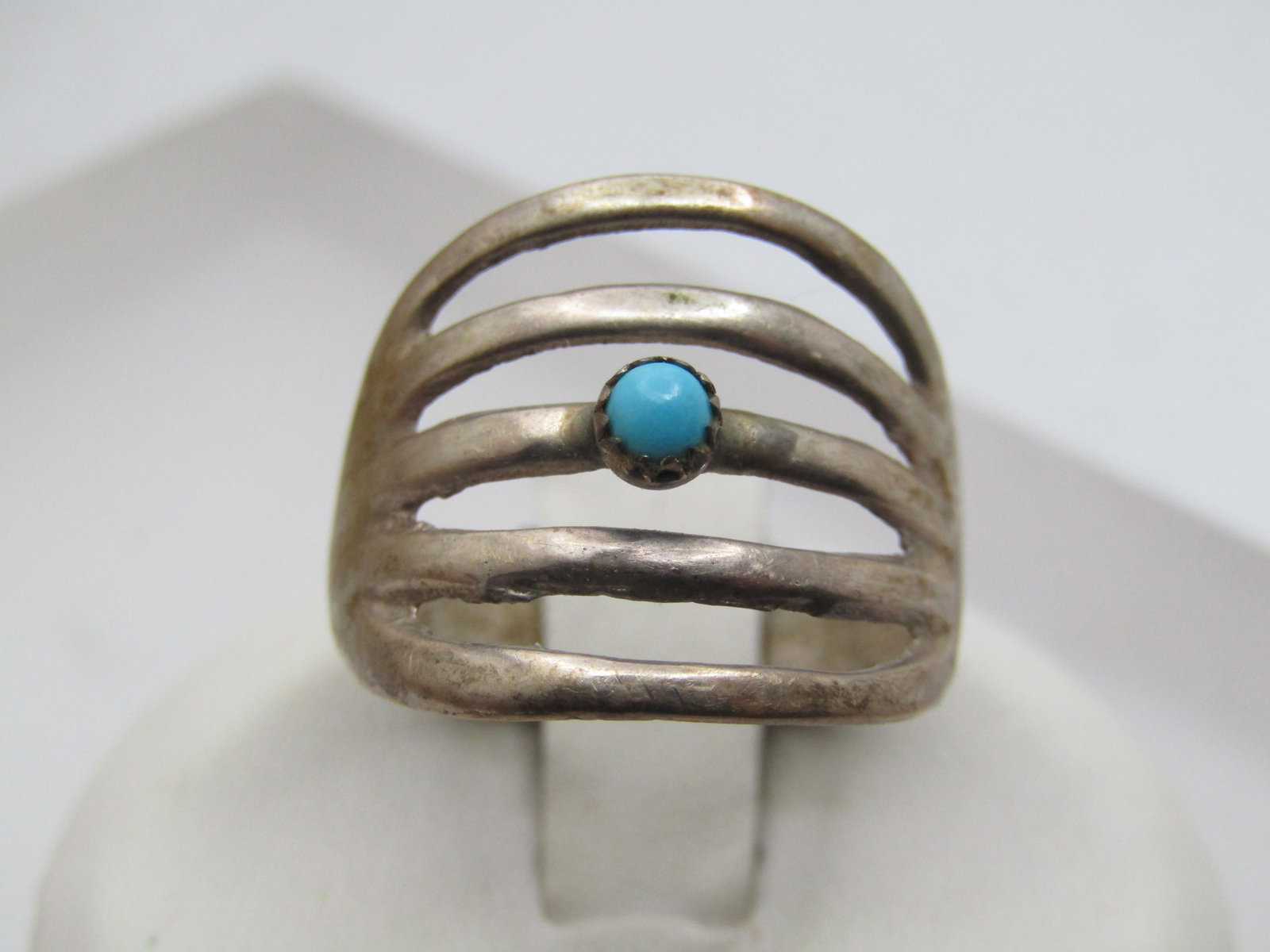 Vintage Sterling Southwestern Turquoise Ring, Sz. 8.25, Snake Eye 1960's-1970's, Unisex.: Vintage Sterling Southwestern Turquoise Ring, Sz. 8.25, Unisex, Snake Eye 1960's-1970's. Five open bands over the finger with a 3mm sawtooth bezel-set turquoise snake eye stone. The ring is appx. 16.5