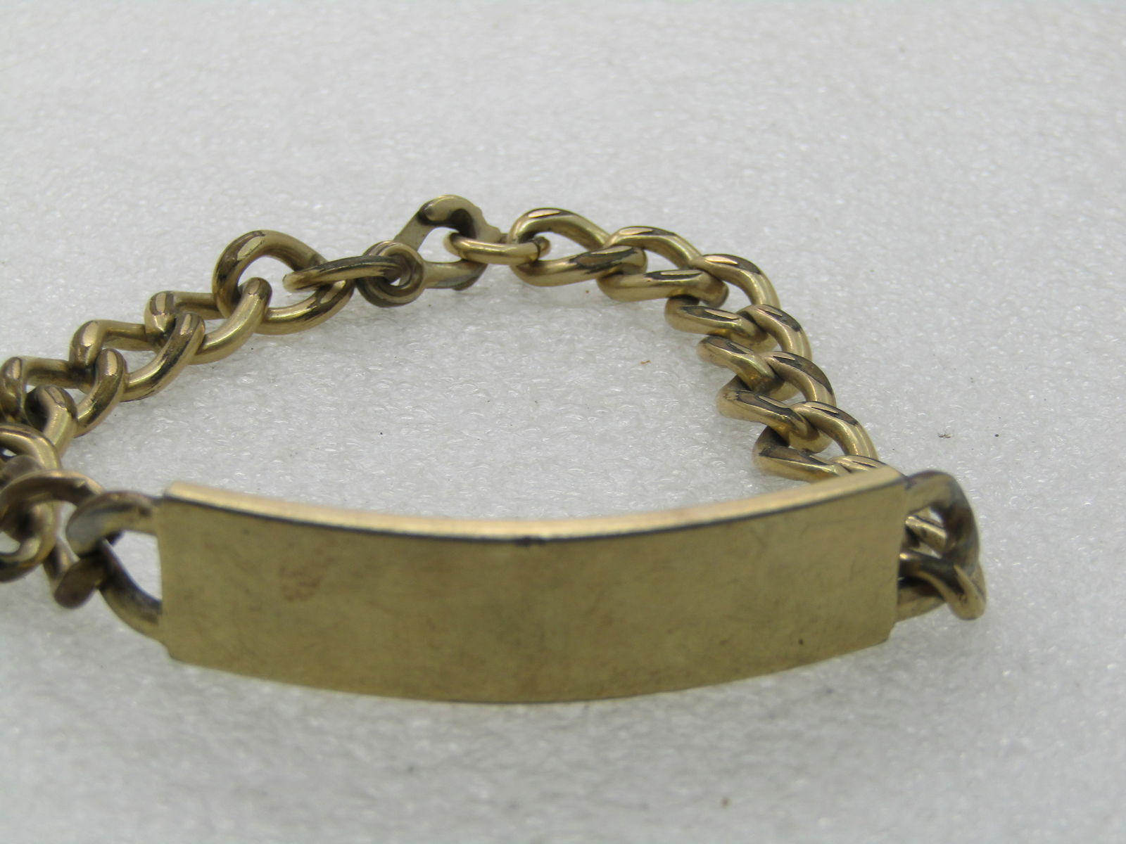 Vintage Elco 12kt GF Men's ID Bracelet, 8.25": Vintage Elco 12kt GF Men's ID Bracelet, 8.25" 8.5mm to 12mm Wide. Signed Elco and marked 12/12kt G.F. The top part of the bracelet is appx. 12mm wide. It has not been engraved but still can be. The cu
