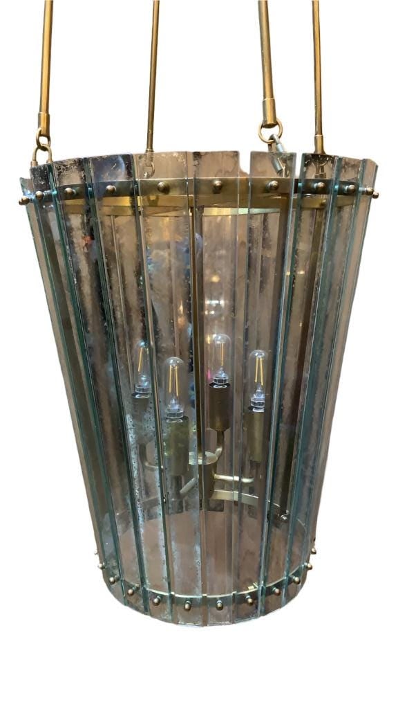 Cadence Small Tall Chandelier by Carrier and Company: Vintage from before 2000 Cadence Small Tall Chandelier by Carrier and Company for Visual Comfort & Co. Defined by its antiqued mirrored glass, the Cadence by Carrier and Company pendant chandelier ech