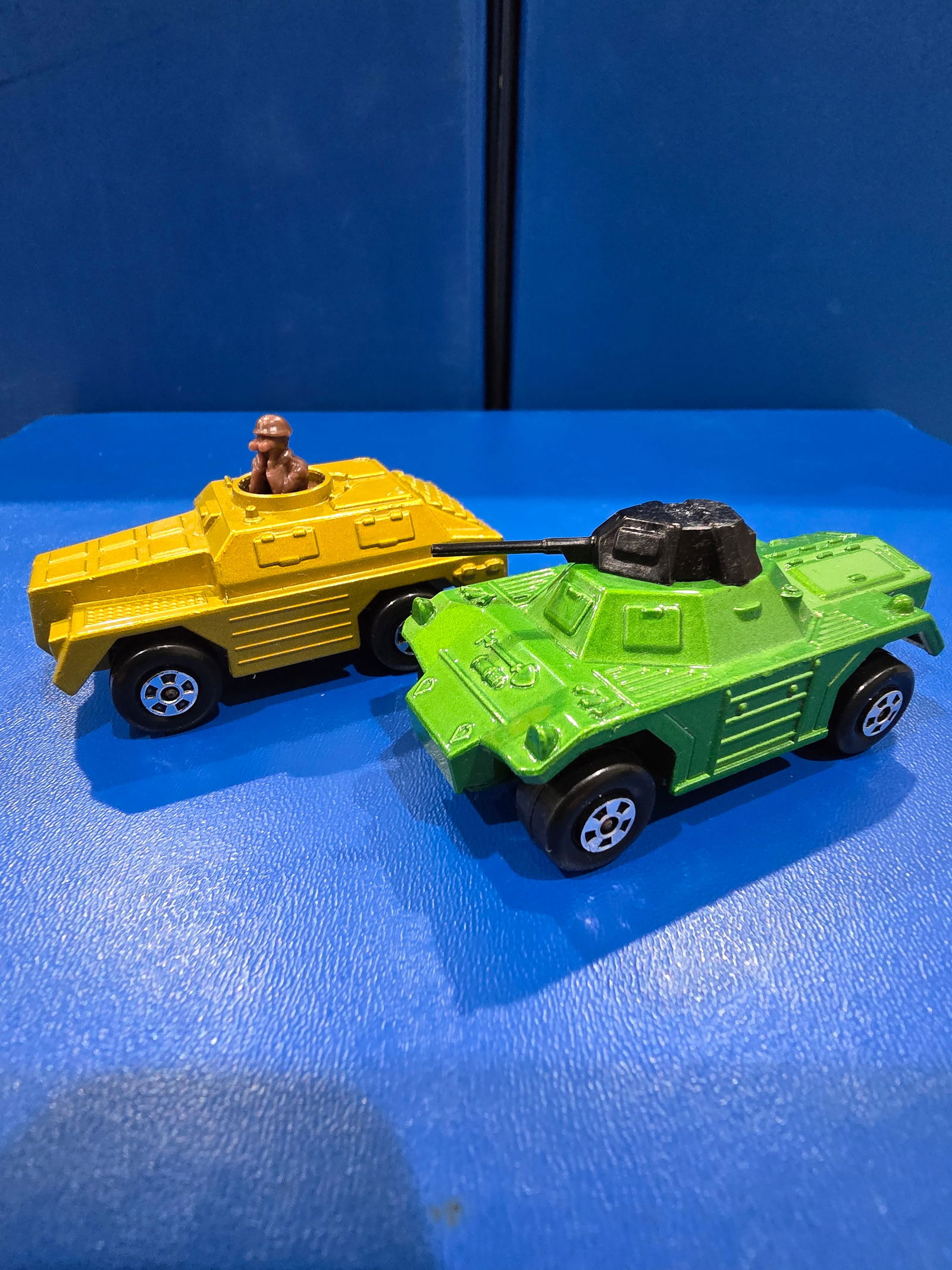 Stoat gold, dark brown solider, silver unpainted and black wheel clips. Weasel green, black gun,: Title: Matchbox Rolamatics Stoat & Weasel Description: Stoat gold, dark brown solider, silver unpainted and black wheel clips. Weasel green, black gun, green glossy base and darker green wheel clips D