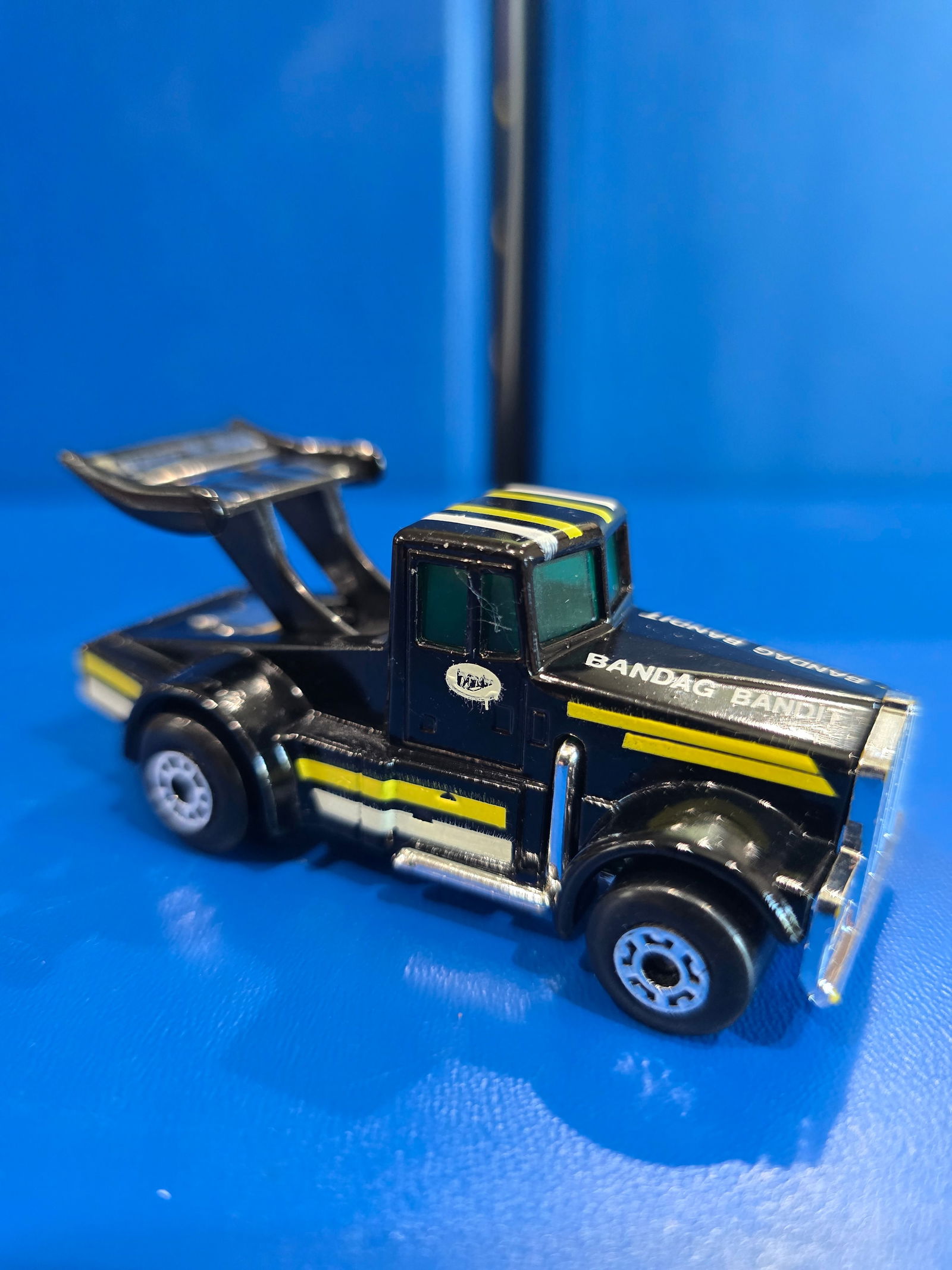 England crome base, black with green glass: Title: Matchbox Tyrone MaloneDescription: England crome base, black with green glassDate/Period: 1982Materials: MetalDimensions: 1/85 Reserve: $15.00 Shipping: Domestic: Flat-rate of $8.00 to