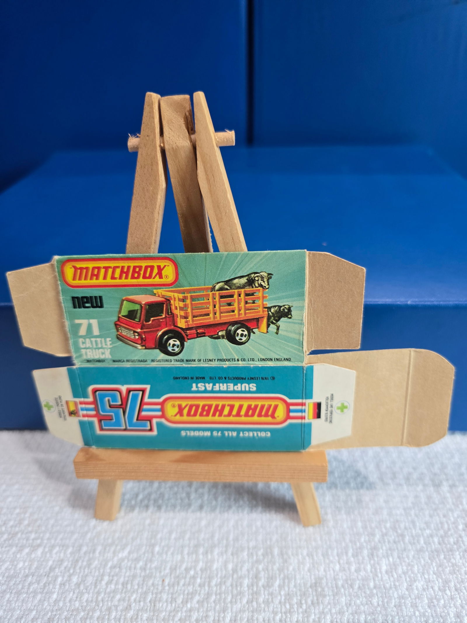 #71 Cattle Truck - empty box: Title: Matchbox Superfast Empty BoxDescription: #71 Cattle Truck - empty boxDate/Period: 1970'sMaterials: Card stockDimensions: 1/64 Reserve: $9.00 Shipping: Domestic: Flat-rate of $6.00 to a
