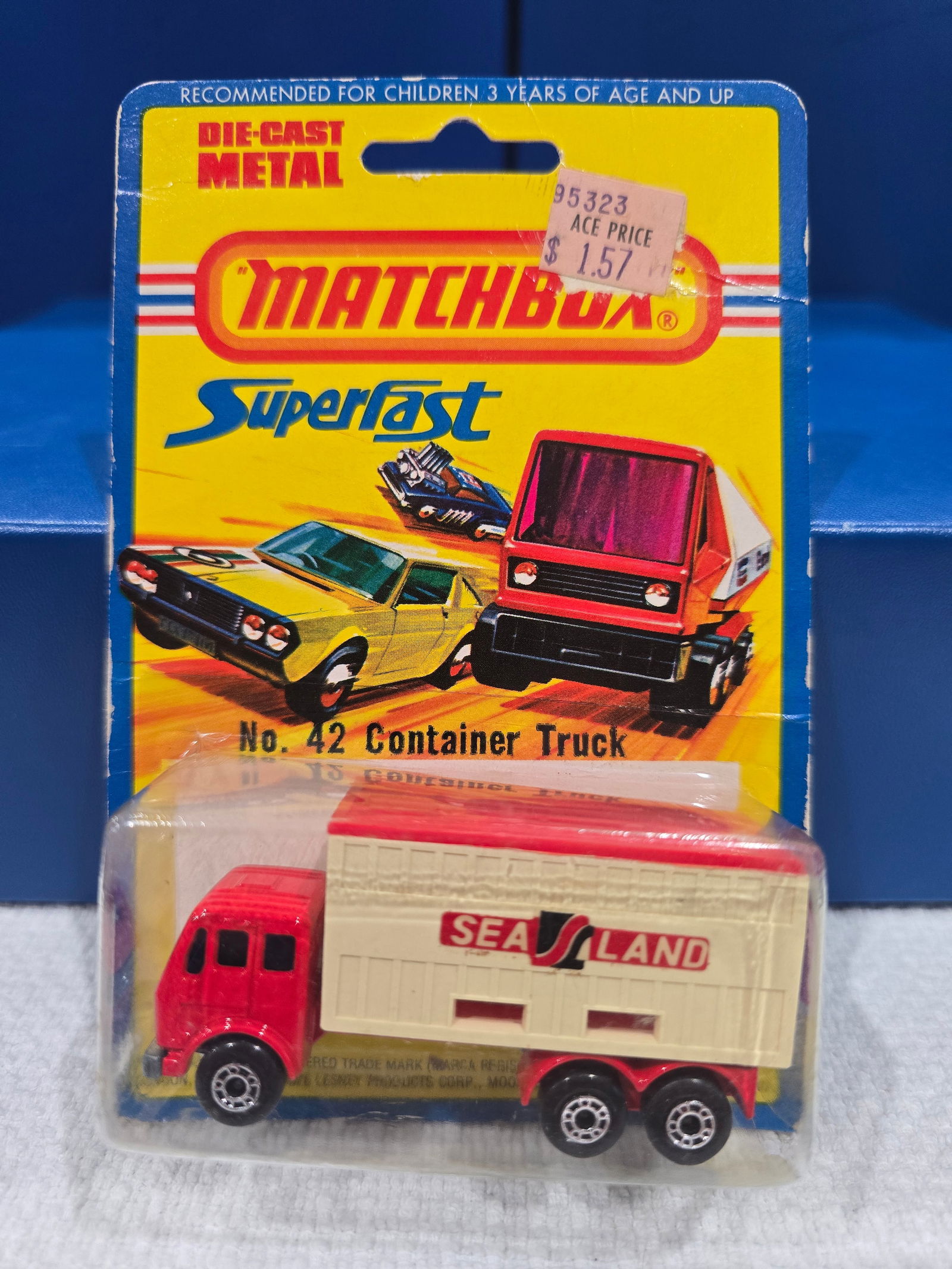 #42 Container Truck, Sea & Land, Siver unpainded base, purple glass, England base, blister has one: Title: Matchbox Superfast BlisterDescription: #42 Container Truck, Sea & Land, Siver unpainded base, purple glass, England base, blister has one cutDate/Period: 1976Materials: MetalDimensions: 1/64 Re