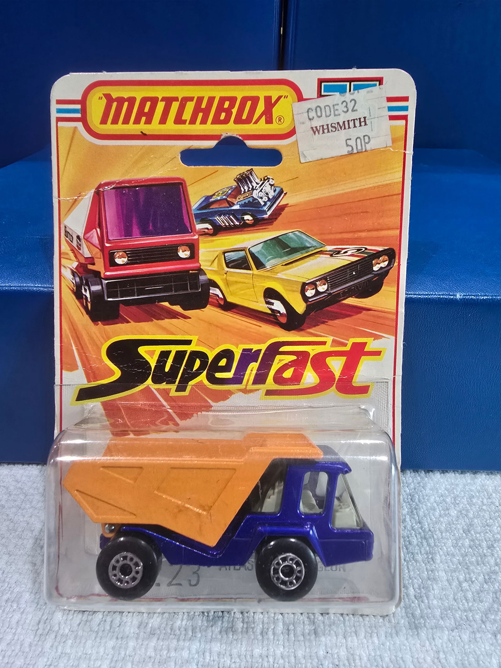 #23 Atlas, Purple, clear glass, white interior, orange bed, Silver painted base (HTF): Title: Matchbox Superfast BlisterDescription: #23 Atlas, Purple, clear glass, white interior, orange bed, Silver painted base (HTF)Date/Period: 1976Materials: MetalDimensions: 1/64 Reserve: $15.00 S