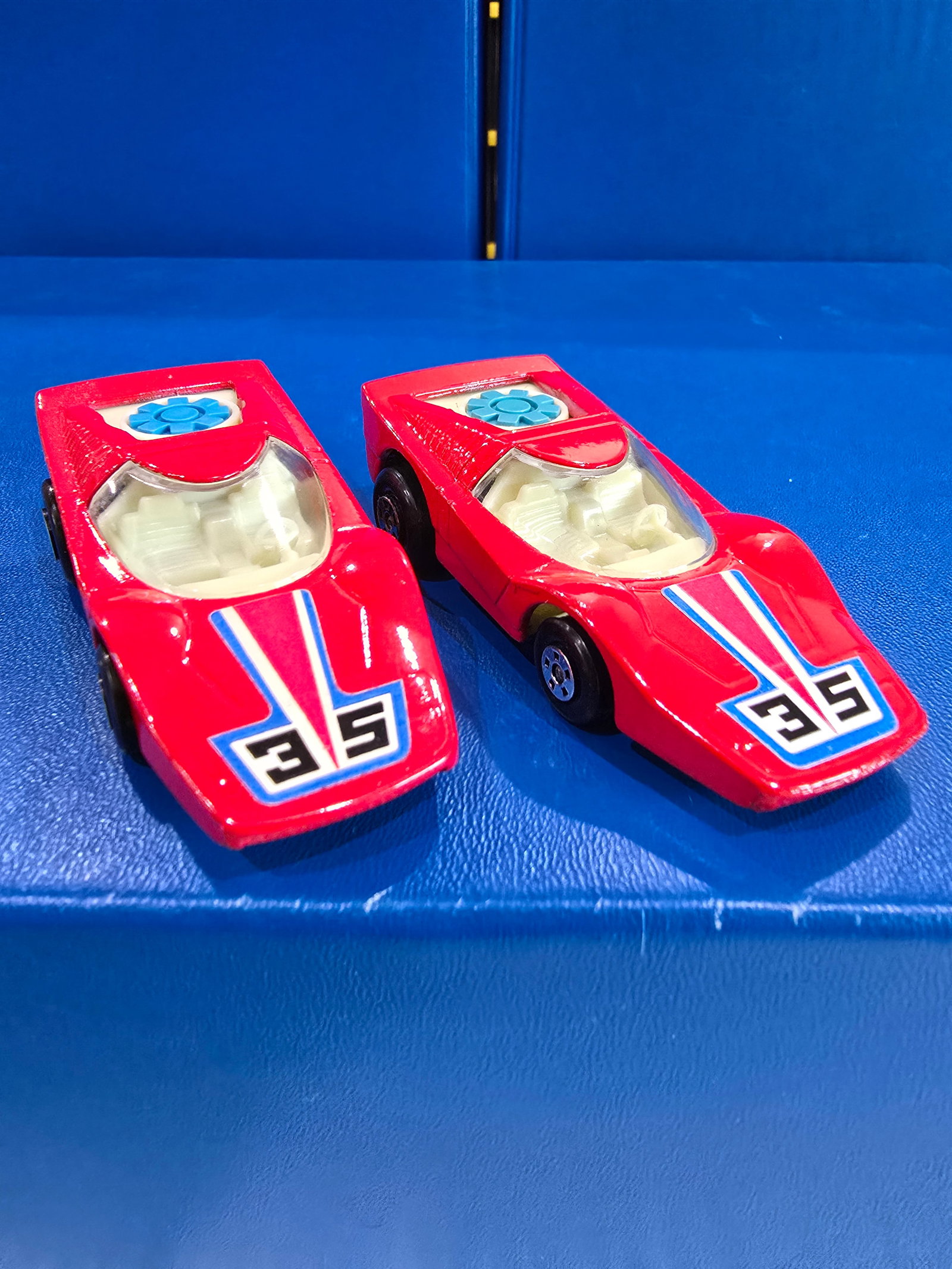 Rola Matics Fandango, two variations, one white base, one silver unpainted base, England base: Title: Matchbox Lot of Loose CarsDescription: Rola Matics Fandango, two variations, one white base, one silver unpainted base, England baseDate/Period: 1975Materials: MtealDimensions: 1/64 Reserve: $1