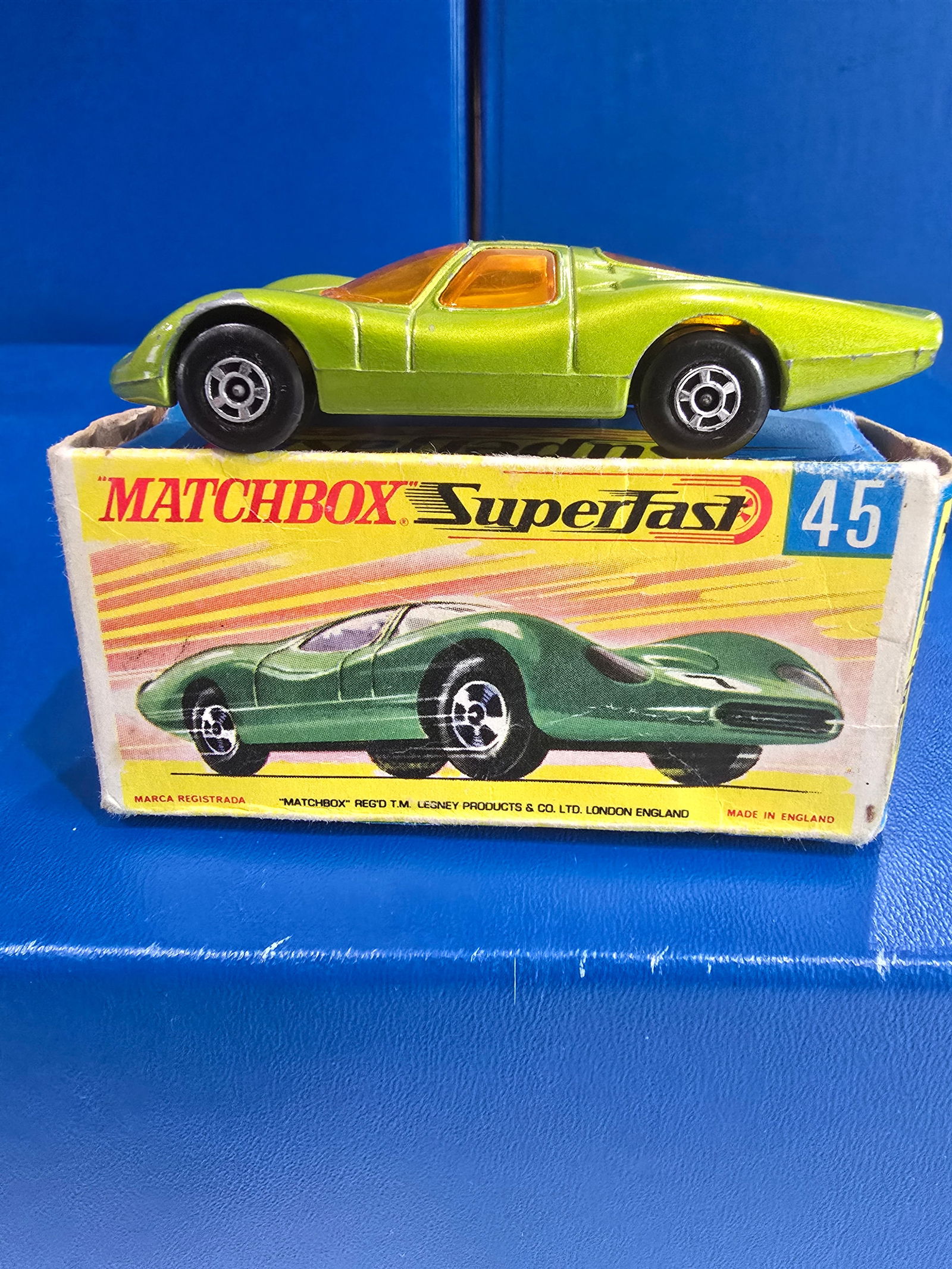 #55 Ford Cortina, England silver unpainted base, metallic tan, white interior, clear glass (1 of 4)