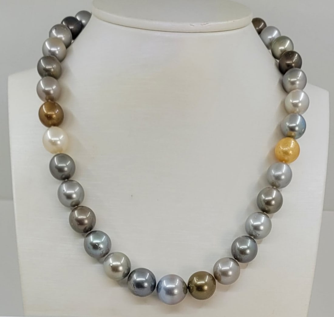 Necklace ALGT Certified Multi Round Tahitian Pearls -10.0x14.1mm: Title:Necklace ALGT Certified Multi Round Tahitian Pearls -10.0x14.1mm Description:This necklace is in the category of the Tahitian Pearls according to the tested results and the ALGT criteria. Emergi