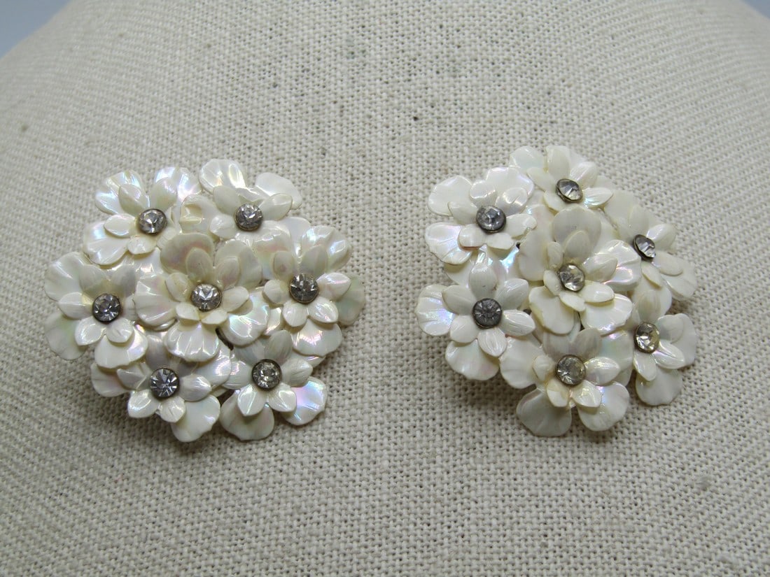 Vintage Pressed Floral Earrings, Rhinestone Centers, Clip, 1940's-1950's: Vintage Pressed Floral Earrings, Rhinestone Centers, Clip, 1940's-1950's. This are appz. 1.75" across with stacked forget-me-not blossoms in a round cluster with a shimmery finish and center appx. 3.5