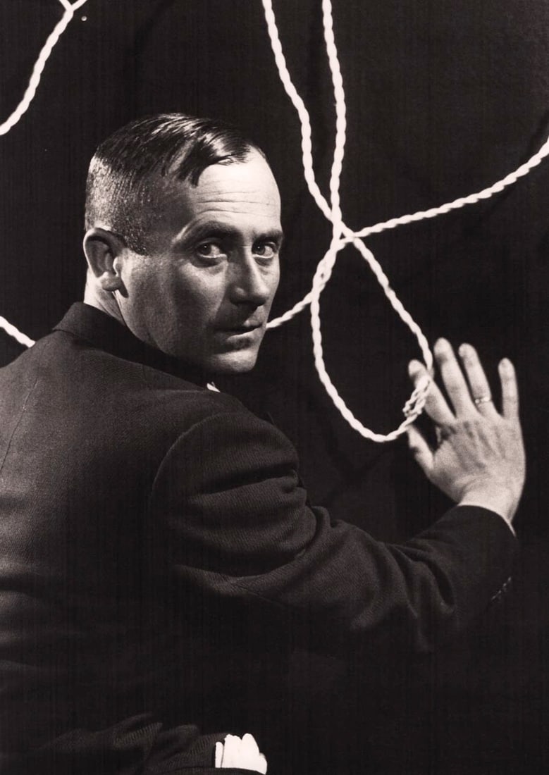 MAN RAY - Joan Miro, c.1930: Artist: MAN RAY Print Title: Joan Miro, c.1930 Medium: Duotone Photolithograph Printed 1980s in Germany Image size (inches) approx. 9 x 7” Man Ray was an American visual artist who spent most of