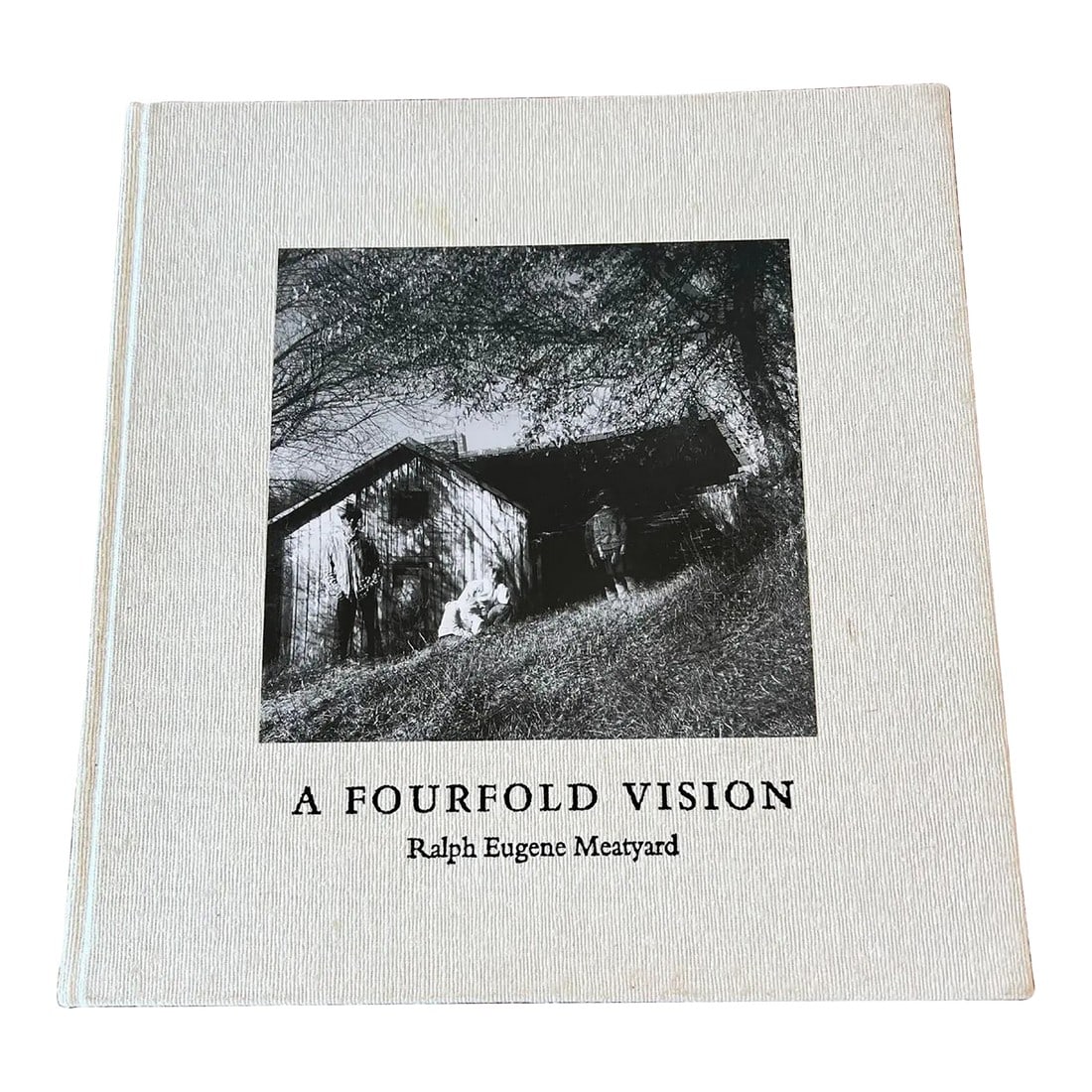 First Edition "A Fourfold Vision" by Ralph Eugene Meatyard, Published 2005: Ralph Eugene Meatyard was an American photographer from Normal, Illinois, U.S. This book, "A Fourfold Vision" depicts his work. Published in 2005. A fabric bound book. Condition: Alterations: Original